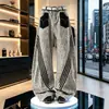 Jeans unisex de pierna ancha, casual, nuevos para primavera/verano, con estampado de leopardo retro transfronterizo, retazos y tres rayas, pierna curva