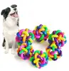 Venta al por mayor de fábrica Bola de cascabel bola de cascabel tejida de colores juguete para perro tpr resistente a mordidas suministros para mascotas