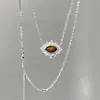 Livrinho vermelho explosões olho de coroa olho de tigre pedra colar retrô estilo corte moda temperamento corrente clavicular uma geração de cabelo