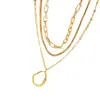 Bestseller transfronterizo: Collar apilado de tres capas con colgante irregular de nácar blanco, cadena chapada en oro, estilo ins, versátil y elegante