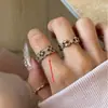 Anillo hueco de trébol de cuatro hojas vintage de color marrón claro de alta resistencia para mujer, diseño francés de lujo ligero, anillo abierto apilable