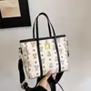 Bolsa Cesta de Legumes para Ir ao Trabalho para Mulheres 2025 Nova Versátil Francesa Ins Bolsa de Mão Exquisite Bolsa Transversal Leve Luxo
