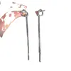 Diseño de nicho estilo frío borla anudada aretes largos elegantes lujo ligero personalidad moda aretes de botón para orejas combinan con todo
