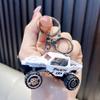 Aleación coche fuerza trasera modelo de coche llavero niños mini coche de juguete muñeca descompresión máquina colgante pequeño venta al por mayor