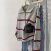 Suéter de punto con cuello polo y media cremallera a rayas para mujer, nuevo otoño e invierno 2024, estilo holgazán, suéter de punto
