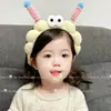 Diadema de cara de dibujos animados para niños, nuevo estilo 2026, linda diadema de felpa para niñas, pinza para el pelo, cómoda de llevar, accesorio para el pelo para niñas
