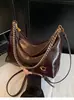 2026 Nueva Bolsa de Axila de Cuero Encerado Retro para Mujer Gran Capacidad para Viajar Cadena de un Solo Hombro Cruzada Versátil Bolsa Dumpling