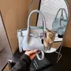 Bolsa de Mão Estilo Cesta de Comércio Exterior para Mulheres, Novo Modelo 2026, Moda de Nicho Versátil para o Dia a Dia, Ombro, Transversal, Bolsa Saco