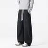 Pantalones deportivos casuales de hombre de la marca de moda estilo americano Tixun para exteriores, nuevo diseño 2026 primavera y otoño, pantalones rectos holgados de retazos