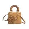 Bolso de mano pequeño cuadrado texturizado popular de este año para mujer, Nuevo Estilo Otoño 2026, bolso de hombro único de bloques de color con letras, bolso cruzado para el trabajo