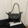 Bolsa pequena estilosa e versátil para mulheres, nova coleção 2026, perfeita para o trabalho e o uso diário, bolsa transversal leve e chique