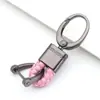 Chaveiro de carro de corda de couro trançado novo do fabricante, simples para homens, liga de zinco, padrão de pendurar na cintura, fivela de cabeça grande, cordão