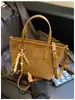2026 Nuevo Bolso Tote de Moda Estilo Coreano Nicho Retro Bolso Cubo Versátil de Alta Gama para Uso Diario de Hombro Único o de Mano