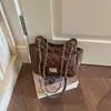 Bolsa pequena feminina da moda, novo modelo 2026, nicho elegante para o dia a dia, com corrente, versão coreana, bolsa transversal