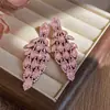 Pendientes de borlas tachonados de diamantes transfronterizos europeos y americanos, pendientes de moda simples de nicho de alta gama, pendientes únicos versátiles y elegantes para mujer