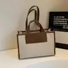 Bolsa de Lona Casual de Grande Capacidade para Mulheres 2026 Nova Moda Bolsa de Mão para o Trabalho Cotidiano Bolsa Tote de Trabalho Simples e Versátil