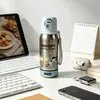 Nueva taza aislada de titanio puro con diseños de dibujos animados, una taza pequeña y portátil de doble uso para niños, adecuada para el uso en desplazamientos, la escuela y la oficina, y con propiedades antibacterianas