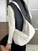 Bolsa de mão da moda e versátil em formato de bolinho para mulheres, nova coleção 2026, bolsa de ombro cruzado, bolsa de axila simples e estilosa, adequada para vendas transfronteiriças