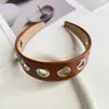 Diadema de Cuero PU de Estilo Nuevo Transfronterizo de Ala Ancha Personalizada Diadema Metálica Hueca Simple Estilo Punk Accesorio para el Cabello Tocado