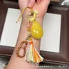 Cera de Abeja de Segunda Generación Varios Estilos Oso Bolsa de Queso Colgante Llavero DIY Exquisito Adorno de Joyería
