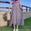 Falda floral morada de estilo Hepburn transfronteriza, estilo extranjero dulce para mujeres bajitas y altas, verano, venta al por mayor