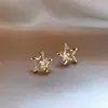 Pendientes pequeños y exquisitos de estrella hueca con circonita, estilo coreano, simples y versátiles, pendientes de diseño elegante para mujer