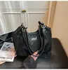 Bolsa grande de camurça retrô para mulheres, nova coleção outono/inverno 2026, bolsa tote, bolsa de mão e bolsa de ombro da moda e estilosas