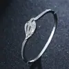 AliExpress deseo Amazon circón microincrustado material de cobre chapado en oro de 18 quilates conjunto de anillo de pulsera Accesorios Al por mayor