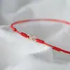 Nuevo diseño de nicho de alta gama tobillera de cuerda roja rica ilimitada pulsera de cuerda tejida para pierna femenina de verano regalo para pareja masculina