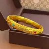 Loja de ouro com esmalte de seda dourada areia pulseira rainha pulseira fechada com moeda novo palácio chinês presente para namorada