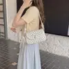 Bolso cruzado de hombro para mujer 2026 transfronterizo, nuevo y elegante, estilo nicho, con lazo, bolso de mano pequeño cuadrado de lunares de alta gama