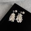 Pendientes de borlas estilo cascada de lujo ligero para mujer, estilo francés de nicho retro, pendientes de perlas, pendientes largos de alta calidad para estilizar el rostro