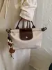 2026 Nuevo Bolso de Hombro Patchwork de Lunares Veraniego Transfronterizo con Estilo y Ambiente Relajado, Bolso de Axila de Viajero de Moda