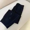 Pantalones de harén de diseño de moda hechos a medida con ribete de color contrastante y cintura elástica, nuevos pantalones casuales versátiles de cintura alta para otoño e invierno 2026