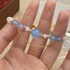 Pulsera Guofeng con cuentas de piedra natural, pulsera fresca con doble borla, pulsera de lujo ligera y de alta gama.