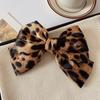 Horquilla con lazo y estampado de leopardo para mujer, tocado de alta gama, elegante, con lazo medio, pinza para el pelo con resorte, pinza superior para niña