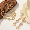 Novo Colar Geométrico Simples e Moderno Flor Oca Pulseira de Temperamento Conjunto de Brincos Personalizados Retrô para Mulheres Vida Diária