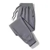 Calça de veludo atacado direto calça casual masculina outono e inverno dedo esportiva zíper roupa externa esportiva calça quente