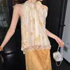 En stockYunxianghuaTop sin mangas de terciopelo grabado burnout con tiras halter 2026 Nuevo de verano Versátil