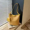 Bolso Bandolera Tipo Cubo para Mujer 2026 Nuevo Estilo de Moda Verano Gama Alta Retro Versátil Bolso de Hombro Único para Debajo del Brazo Bolso para Viajes