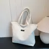 Nova Bolsa Feminina de Veludo Versátil Casual Simples de Primavera Grande Capacidade Bolsa de Mão para Estudantes e Commuters Bolsa de Ombro