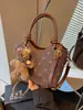 Cross2026 Otoño Invierno Nuevo Estilo Coreano Estilo Perezoso Bolso Cubo Bolso de Mano Corazón Elegante Moda Bolso de Hombro Cruzado Individual
