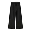 Pantalones casuales de moda para hombre con una caída fluida, que presentan un elegante diseño de cintura, una estética única de corte limpio inspirada en Japón y un corte recto, holgado y de color liso.