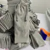 Ventas Directas de Fábrica en Stock, Logo Personalizable, Bolsa de Almacenamiento para Palillos de Silicona, Bolsa de Terciopelo Gris de 9*25 cm, Hecho a Medida