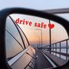 Pegatinas reflectantes para espejo retrovisor que indican precaución al conducir en el extranjero.