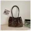 Bolsa Tote de Ombro Creme com Bolinhas Pretas e Laço Estilo Coreano 2026, Bolsa de Ombro Suave e Única, Bolsa de Mão Versátil para o Dia a Dia
