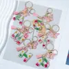 Suministros del Fabricante Llaveros con Flores Secas Prensadas 26 Letras del Alfabeto Inglés Llaveros con Borla de Mariposa Charms para Bolsos de Mujer