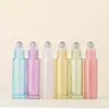 Botella de vidrio con roller de 10 ml de color para venta al por mayor, botella go ball, botella de vidrio, botella vacía, botella para aceite esencial, botella de perfume de vidrio, botella