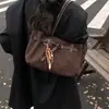 Bolsa Satchel Retro de Nicho para Axila com Acabamento Fosco para Mulheres Nova Tendência Outono 2025 Bolsa de Ombro Estilosa para o Dia a Dia
