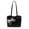 Bolso grande de mujer estilo coreano 2026 nuevo bolso de mano de moda moderno bolso de hombro simple para el uso diario bolso de axila